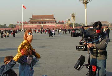 Rick Lyon and Monkey in Tienanmen Square